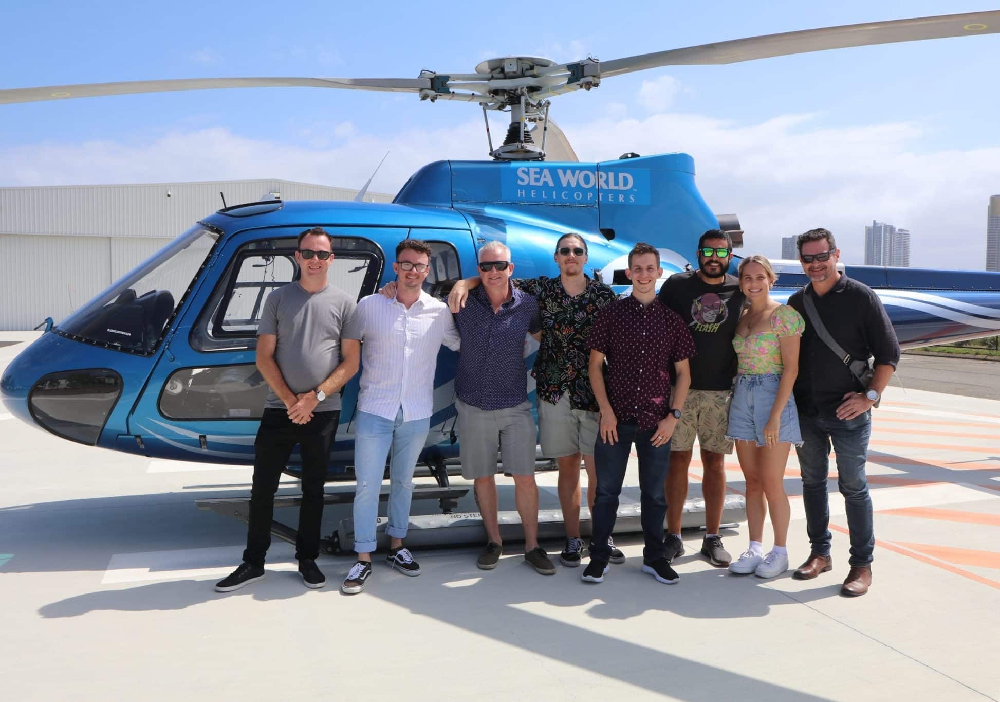 Helicopter flying towards the coast for Gold Coast island getaway