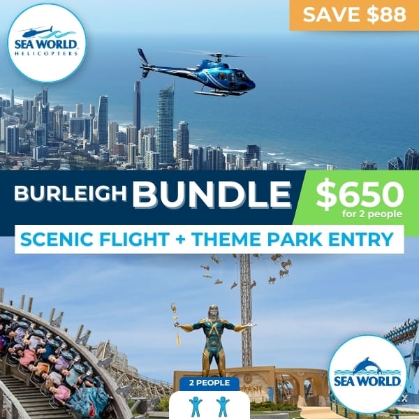 Mum and child smiling inside helicopter during Burleigh Heads family scenic tour